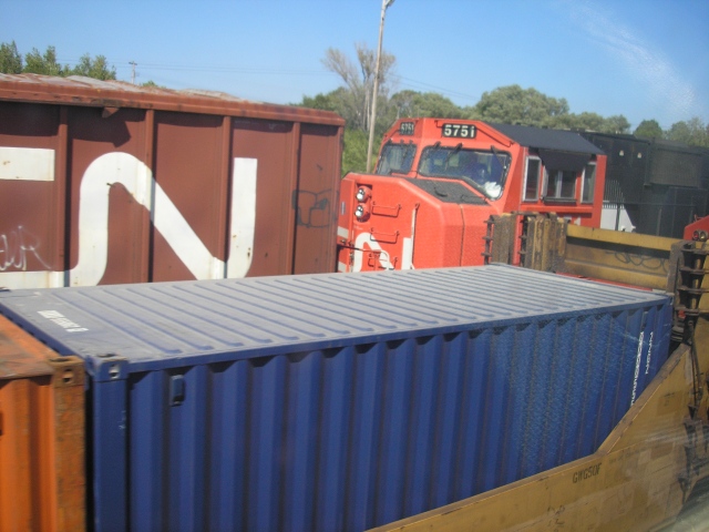 CN Freight-Train passing a VIA rail passenger train